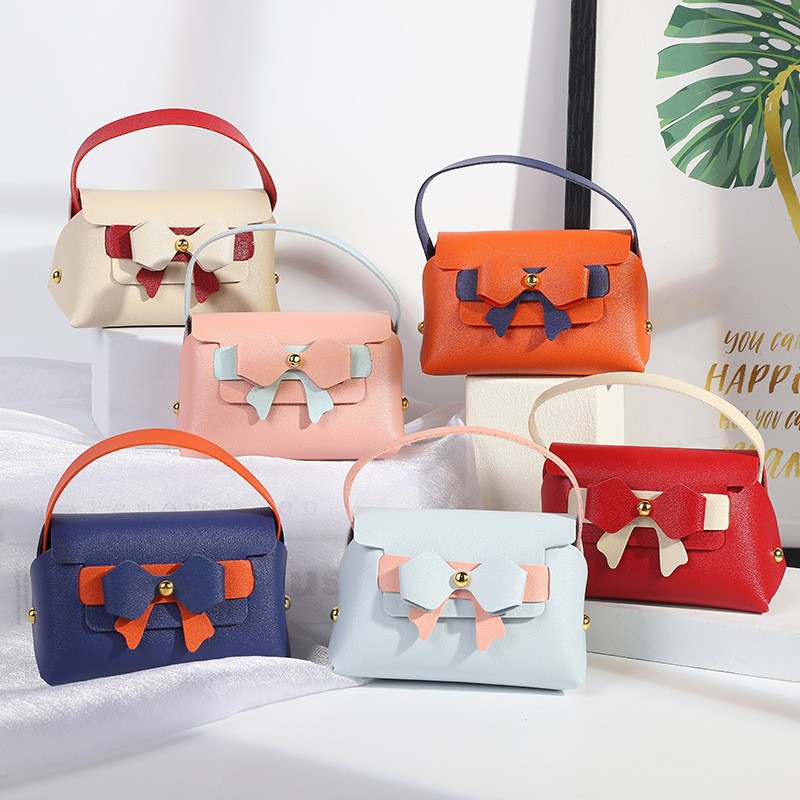 10 ピース/ロットインズちょう結びハンドバッグギフトボック - Wedding Supply Wholesale のレビューと価格