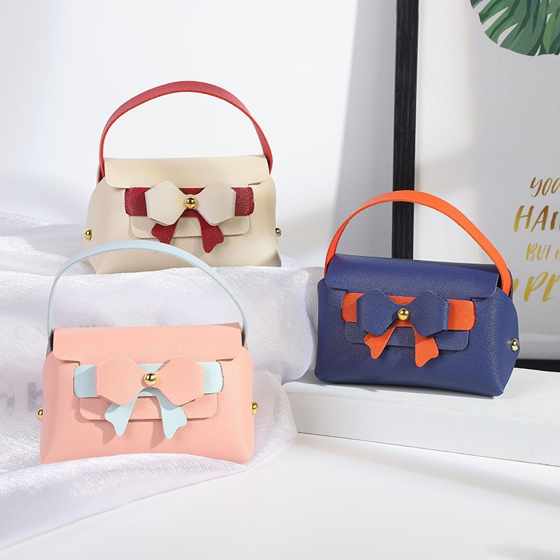 10 ピース/ロットインズちょう結びハンドバッグギフトボック - Wedding Supply Wholesale のレビューと価格